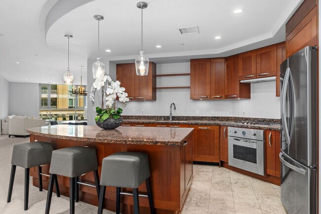 Building Photo - Spacious Irvine Financial District Condo with Full Service Amenities