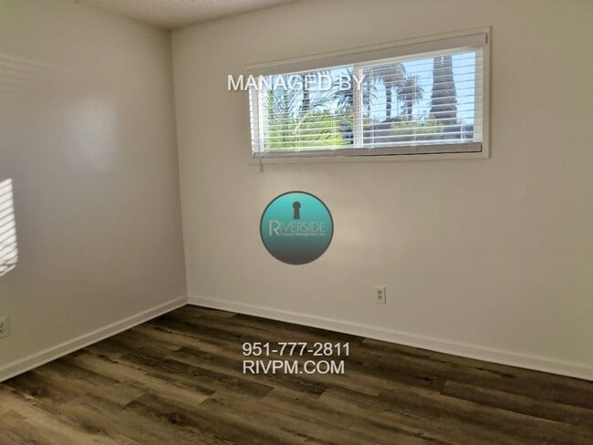 Building Photo - Welcome home to this beautifully refreshed...