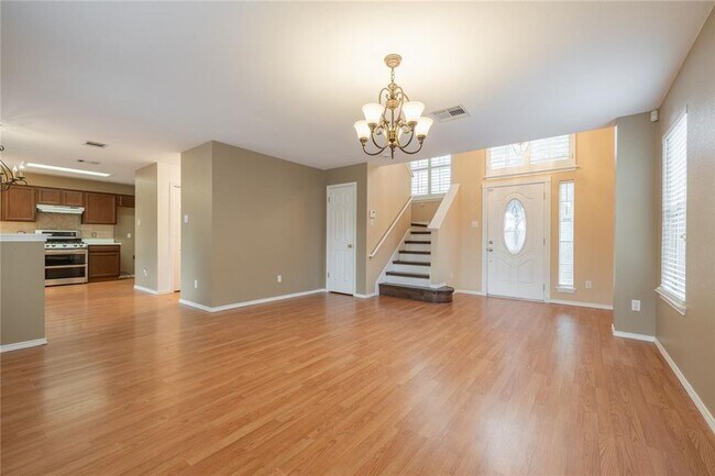 Building Photo - No Carpet! Tons of Space! Beautiful backyard with large covered patio!