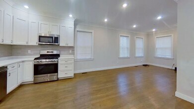 Building Photo - No Fee Luxury Unit in Packards Corner!  Pet Negotiable, Laundry in Unit!