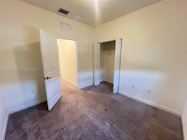 Building Photo - 11080 W 32nd Ln