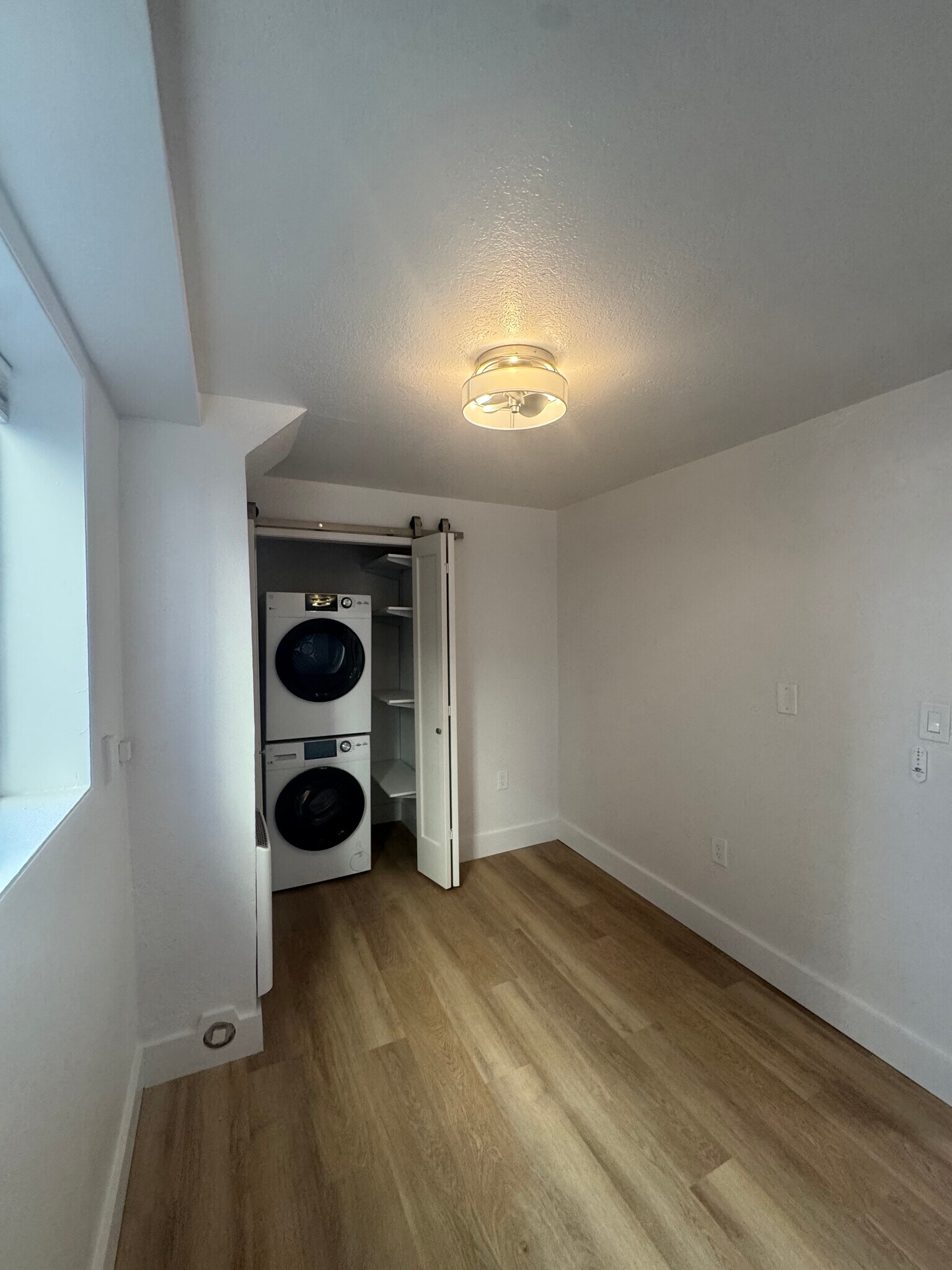 Bedroom/office 1 with in-unit laundry - 3948 S Brandon St
