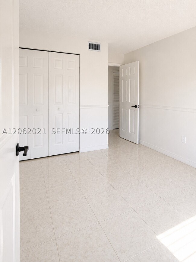 Building Photo - 6095 W 18th Ave