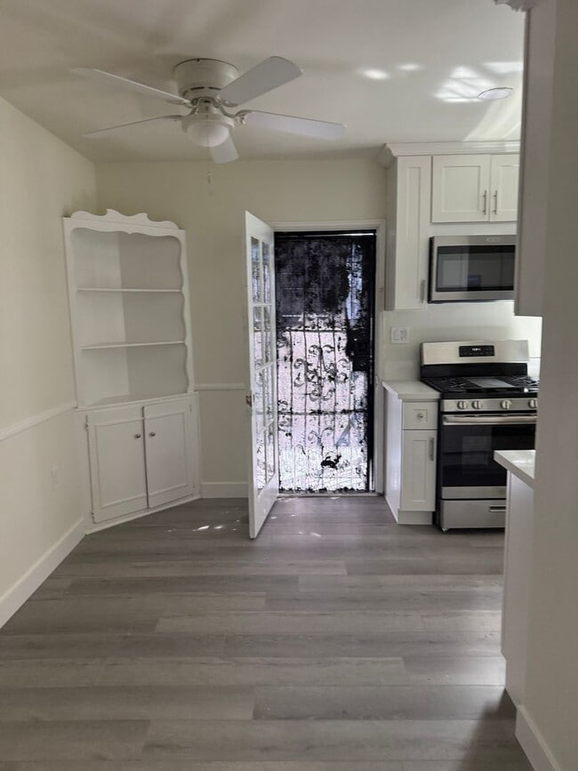 Building Photo - FOR RENT — COMPLETELY REMODELED Apartment