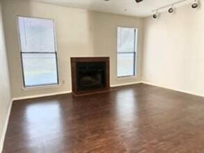 Building Photo - First-Floor 2BR/2BA Condo in Plano with Fireplace + 2 Carports