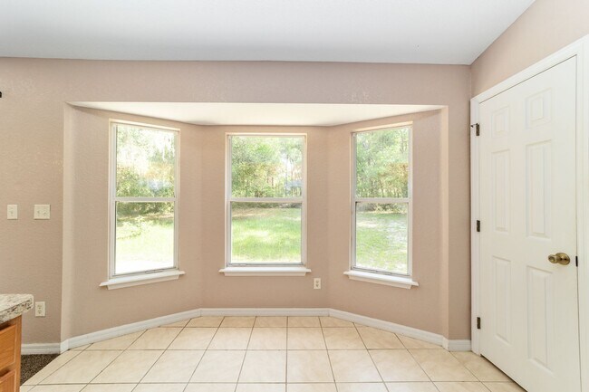 Building Photo - Peaceful 3-Bedroom Home with Open Floor Plan & Two-Car Garage in Rainbow Lakes Estates!