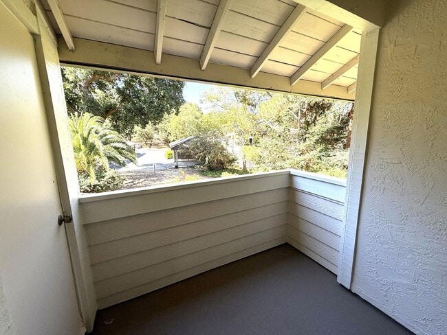 Building Photo - UPPER END UNIT TWO BED / TWO BATH CONDO IN...