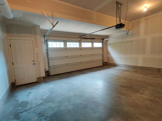 Building Photo - RENT REDUCTION; Modern Hawks Prairie Townhome