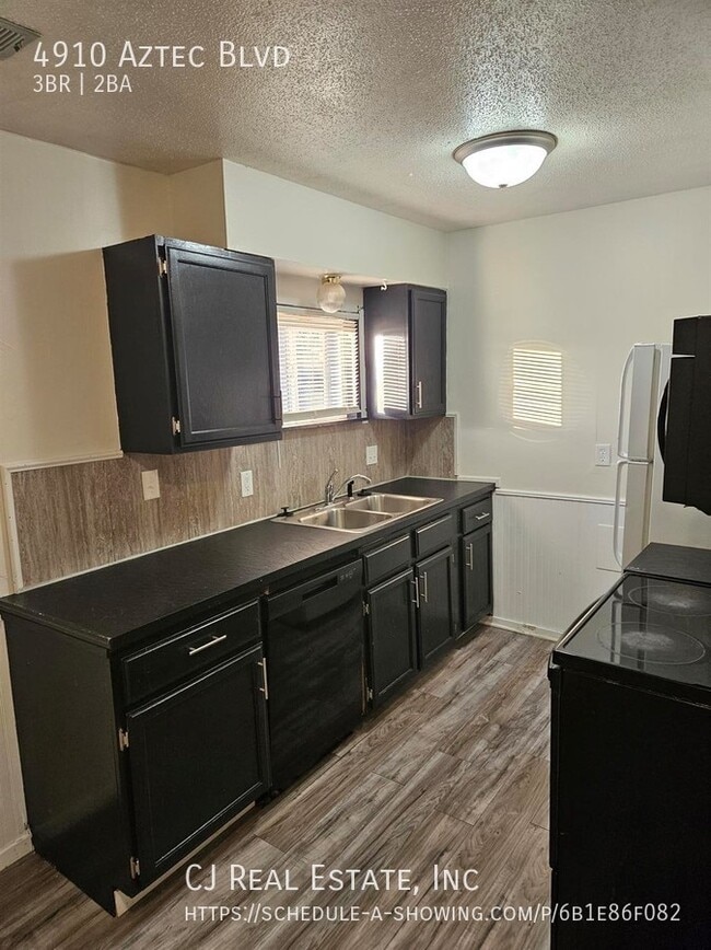 Building Photo - 4910 Aztec Blvd