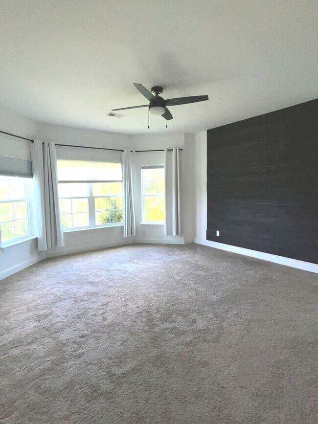 Building Photo - "Spacious 4-Bed Oasis with Stunning Lake V...