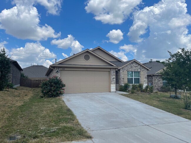 Building Photo - Three Bedroom, Two Bath, Two Car Garage, Washer and Dryer are included.