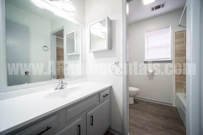 Building Photo - 8209 Woodview Dr E