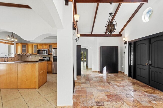Building Photo - 7975 Sunset Dr