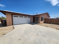 Building Photo - Two Bedroom Home with Two Car Garage