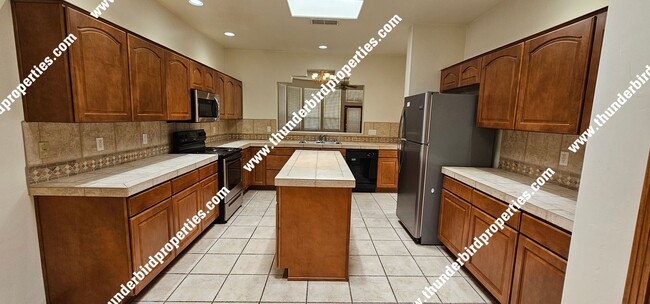 Building Photo - Beautiful and Spacious in NE Heights Gated...