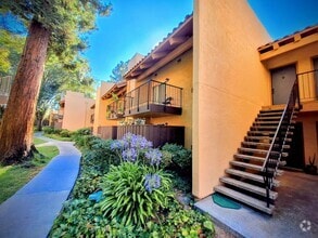 Building Photo - Beautifully Remodeled Second Floor Condo A...