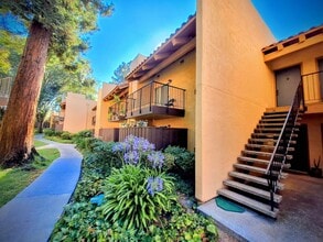 Building Photo - Beautifully Remodeled Second Floor Condo Across From Pool
