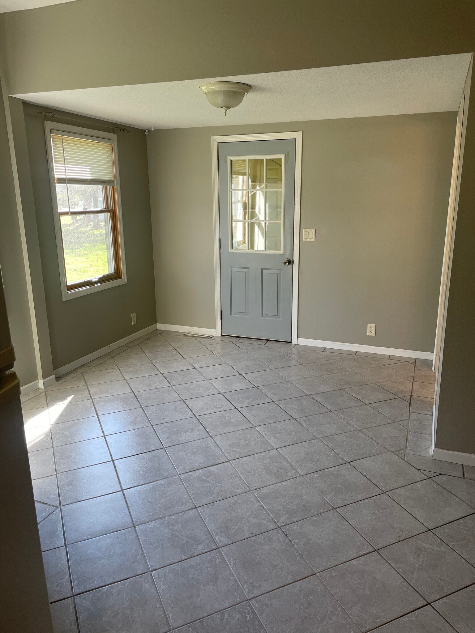 Eating area off of kitchen and door to garage - 16988 N 7th St