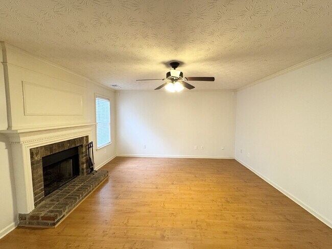 Building Photo - Rare Sugar Hill Rental with Huge Fenced Yard and Outdoor Living Space