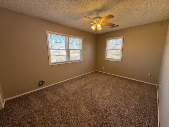 Building Photo - Home With 2 Living Areas Located Near School & W. Loop 289 / Marsha Sharp Fwy Access!