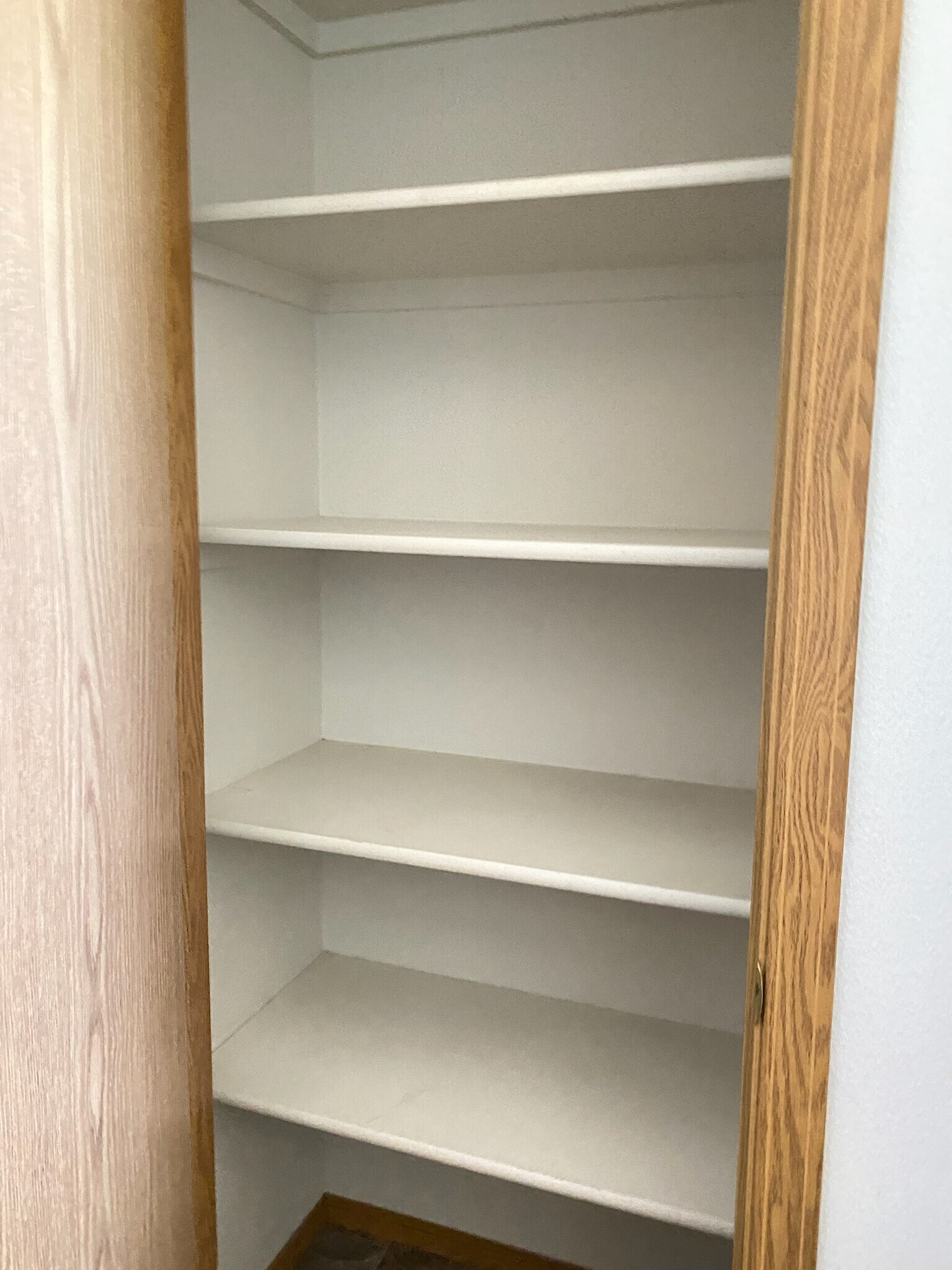 Linen closet in upstairs full bath - 1415 E Maple St