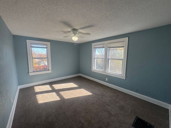 Building Photo - Charming 3BR 2BA Home w/ Fenced Yard + Covered Porch in KC