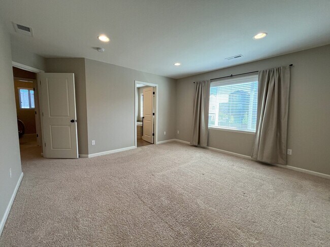 Building Photo - Spacious 4-Bedroom + Bonus Room with Modern Kitchen, Solar Panels & Private Fenced Backyard!