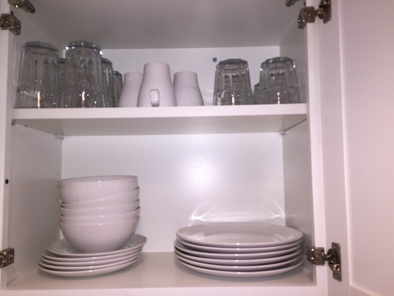 your dishes and glassware in this fully furnished kitchen - 43 Girard St. NE