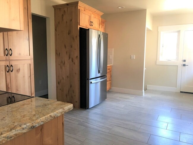 Building Photo - Beautiful Remodeled Home with Huge Bonus Space and Private Fenced Backyard!