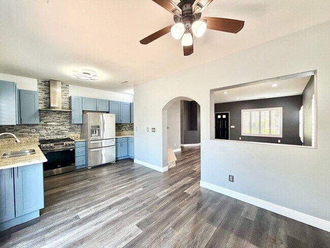 Building Photo - Beautifully Renovated 4 Bedroom Home with INCLUDED Solar, Large Backyard & Gazebo