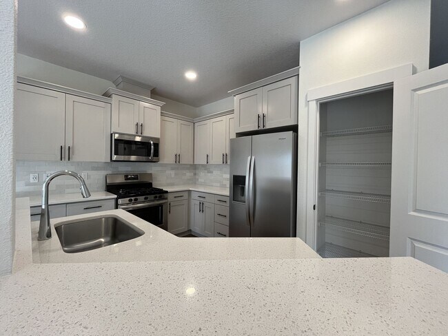 Building Photo - Modern 2022-Built 3-Bedroom Home with Open Layout, Entertainer’s Kitchen. Near Parks & Playgrounds