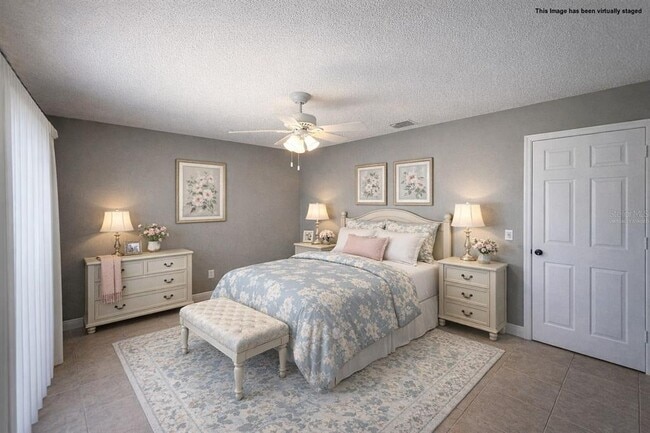 Building Photo - 6525 Manila Palm Way