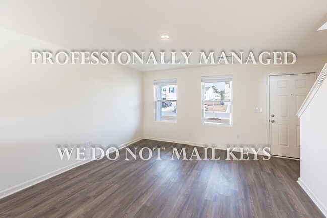 Building Photo - 7009 Peppermill Way