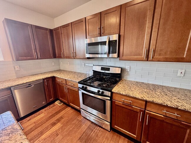 Building Photo - Large 4 bedroom home with a Fully Finished...