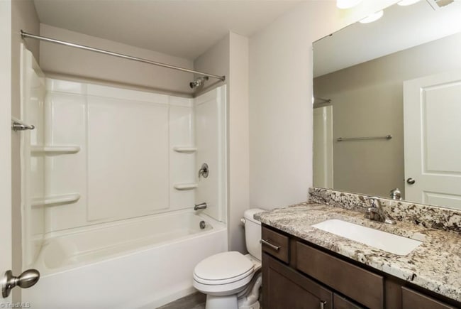 Building Photo - Impeccable maintenance-free 2 level 4 bedr...