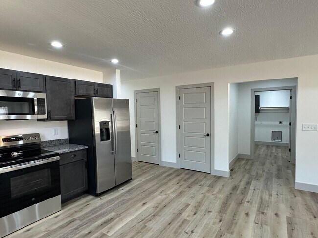 Building Photo - NEW 5 Bed 3 Bath w/ Walk Out Basement Waynesville School District