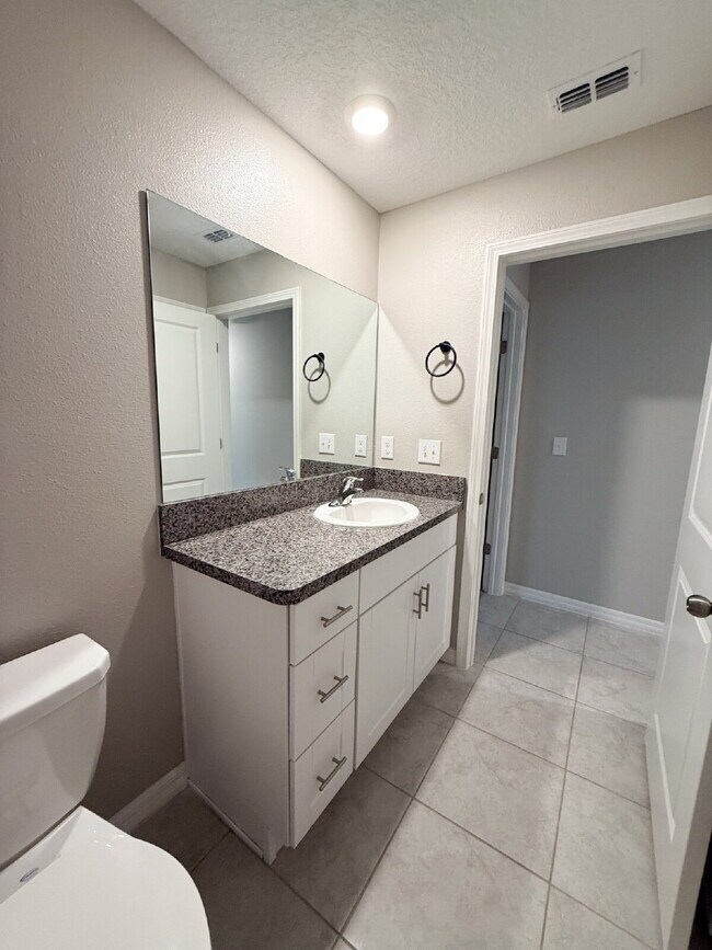 Building Photo - LIKE NEW 4-Bedroom, 2 Bath home in Triple ...