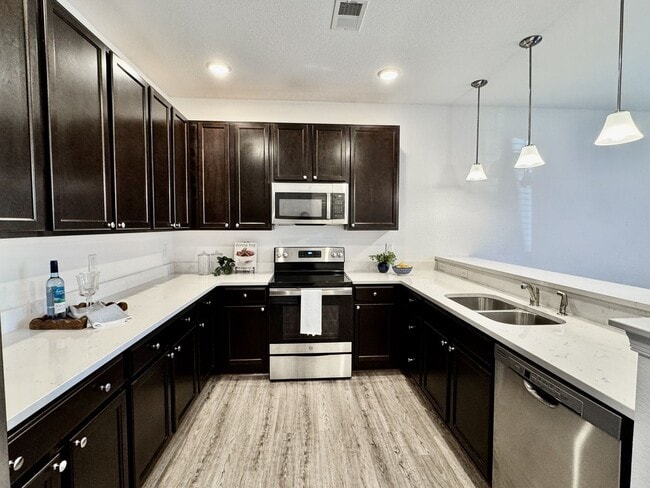 Building Photo - Available NOW! 1st Time Rental! Water, Sewer Trash, Landscaping, Community Pool Included!