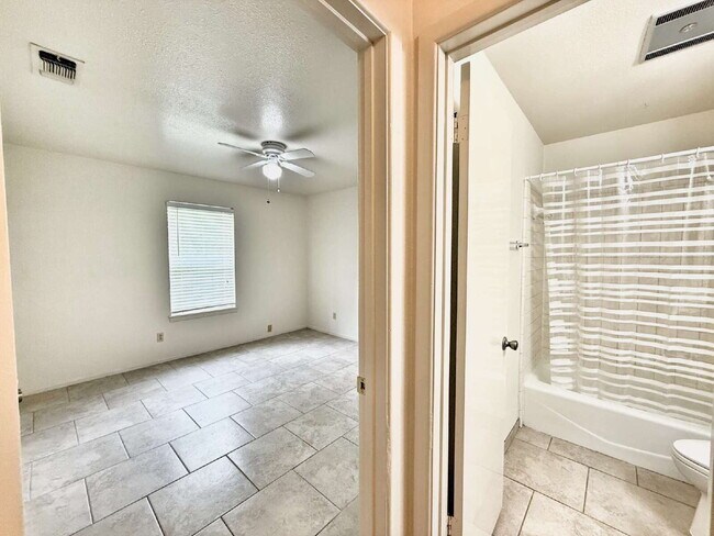 Building Photo - Prime Location! Fresh Paint – Charming 2BR...