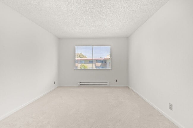 Building Photo - Modern 2-Bedroom Condo with Pool and Koi Pond Views