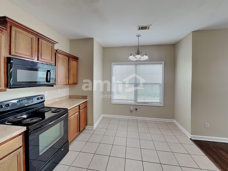 Building Photo - 6903 Grand Hickory Dr