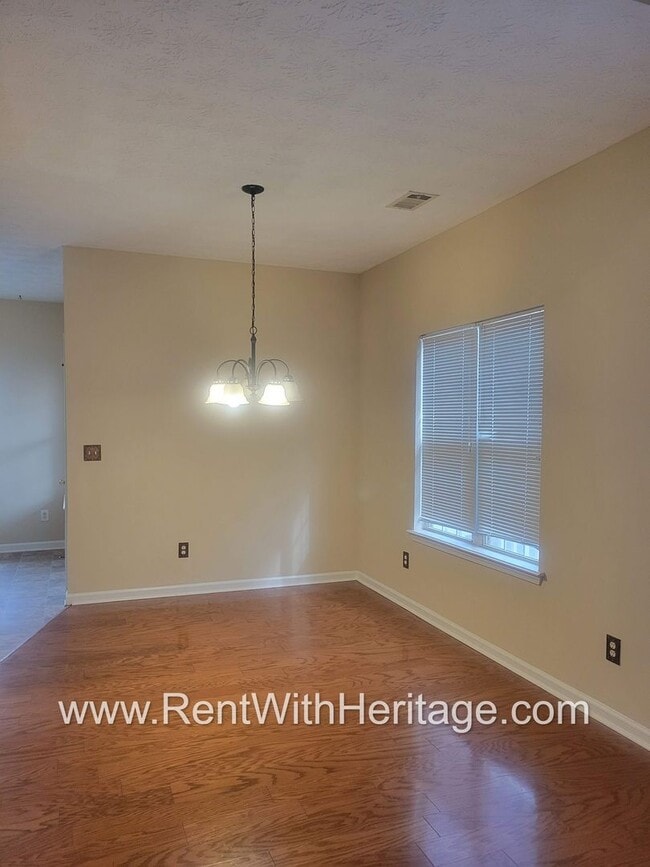 Building Photo - WOW!!...GORGEOUS HOME/HARDWOOD FLOORS/ UPGRADES GALLORE / SWIM - TENNIS