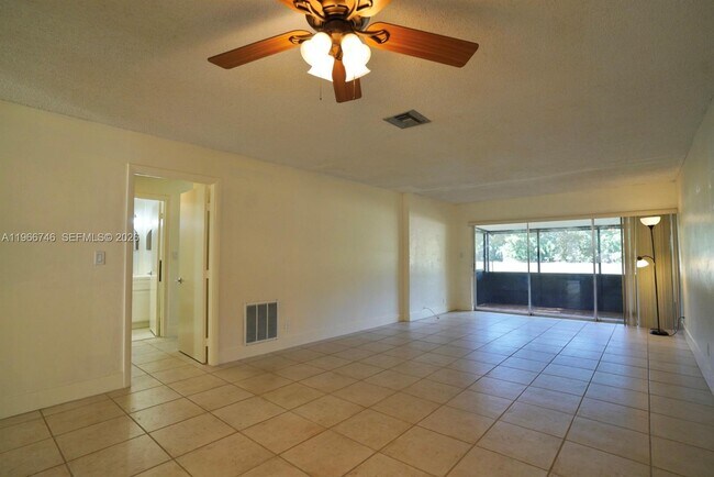 Building Photo - 6555 NW 99th Ave