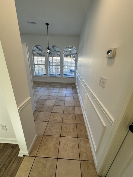 Kitchen with view of backyard. - 1701 Water Oak Dr