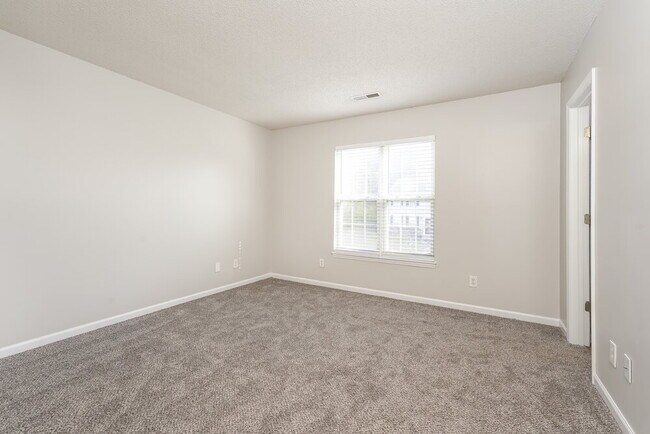 Building Photo - 5209 Carriage Woods Dr