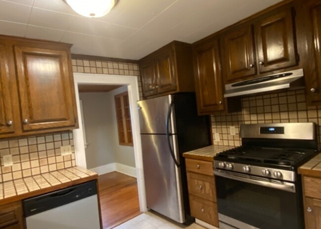 Kitchen with stainless appliances - 95 Logan Ln