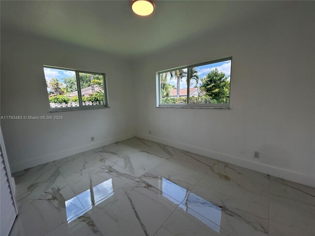 Building Photo - 11751 SW 52nd Ct