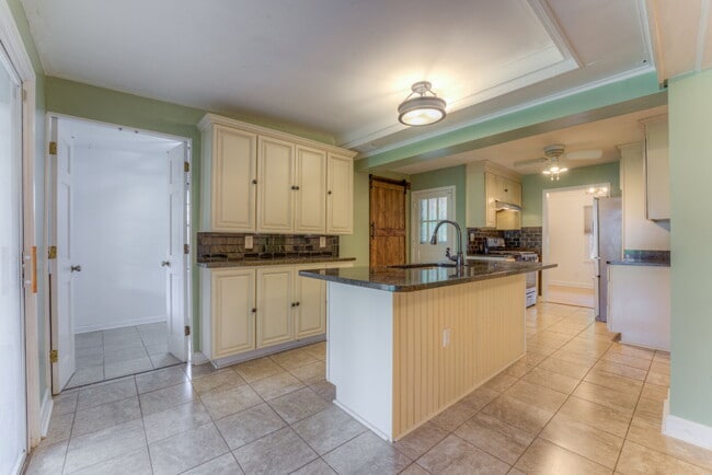 Building Photo - "Charming 4-Bedroom Sanctuary on Boyce Roa...