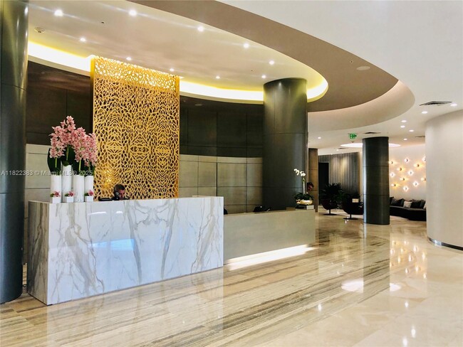 Building Photo - 10275 Collins Ave