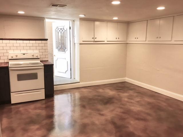 Huge eat in kitchen with tons of built in storage. - 2261 Newark st